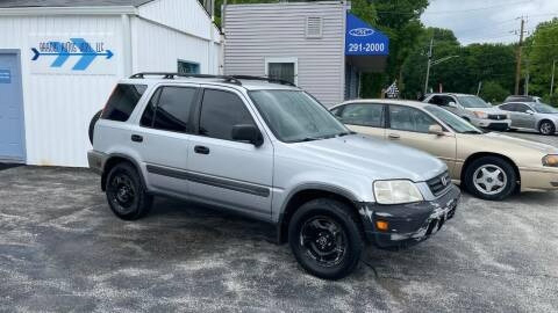 2001 Silver Honda CR-V LX 2WD (JHLRD28411S) with an 2.0L L4 DOHC 16V engine, 4-Speed Automatic Overdrive transmission, located at 2710A Westlane Rd., Indianapolis, IN, 46268, (317) 291-2000, 39.885670, -86.208160 - Photo#2